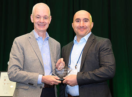 Aleksan Shanoyan accepting AAEA teaching award